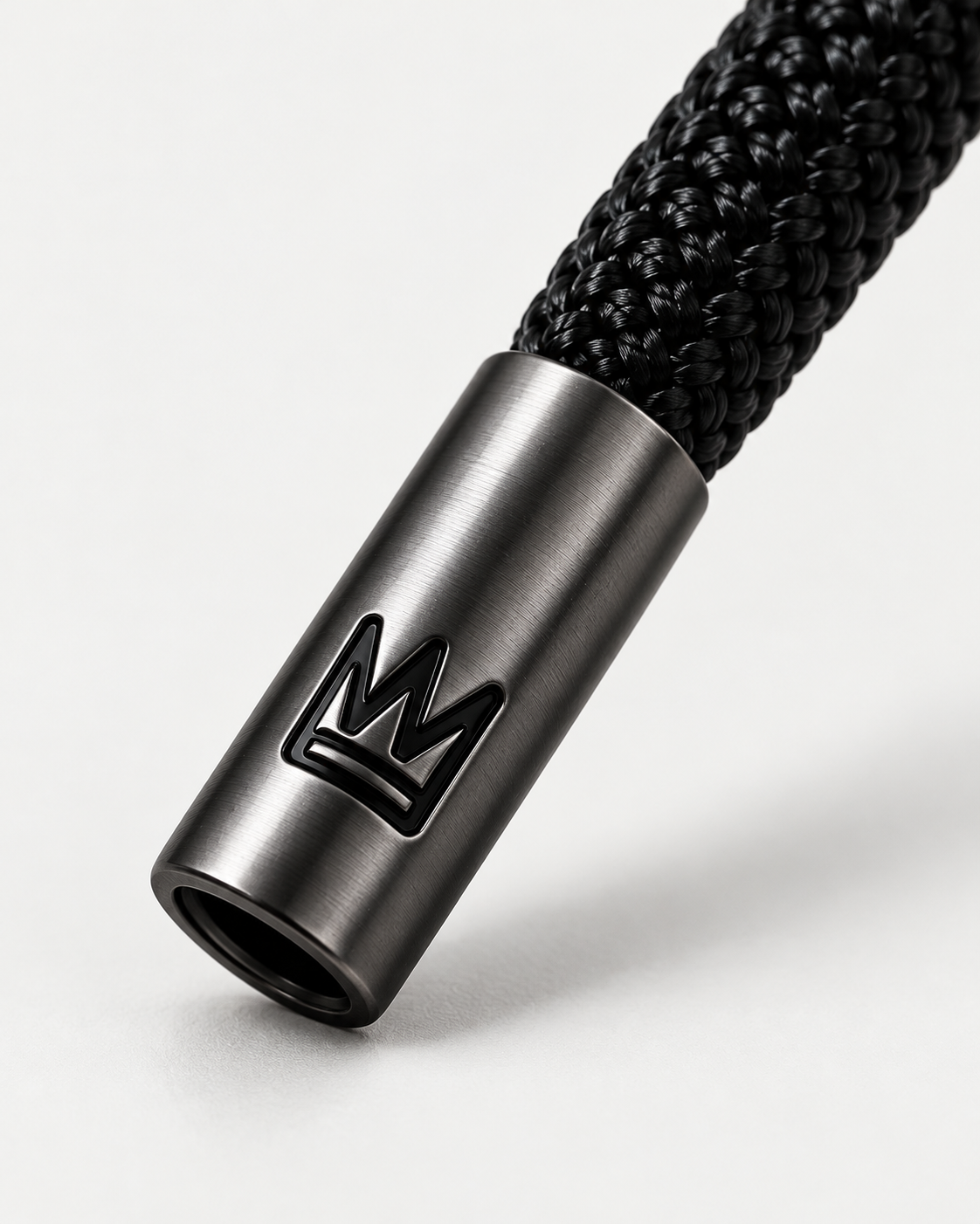 Crown-engraved aglet